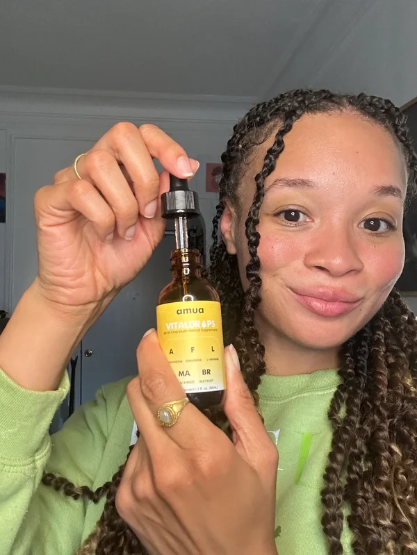 Monalisa M holding Amua Vitaldrops